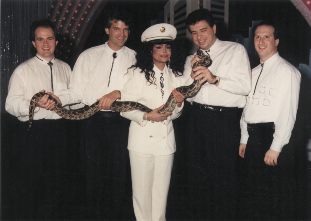 Here’s Paul with LaToya Jackson trying to avoid being bitten by a very big snake